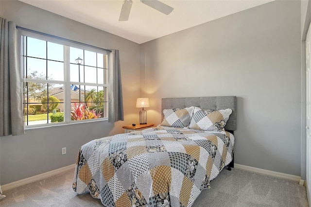 bedroom featuring carpet and ceiling fan