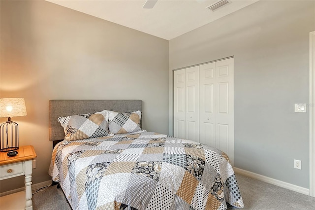 carpeted bedroom with a closet and ceiling fan