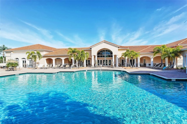 view of swimming pool featuring a patio area