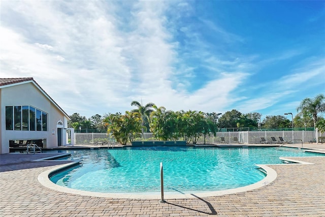 view of swimming pool featuring a patio