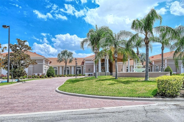 view of front of property with a front lawn