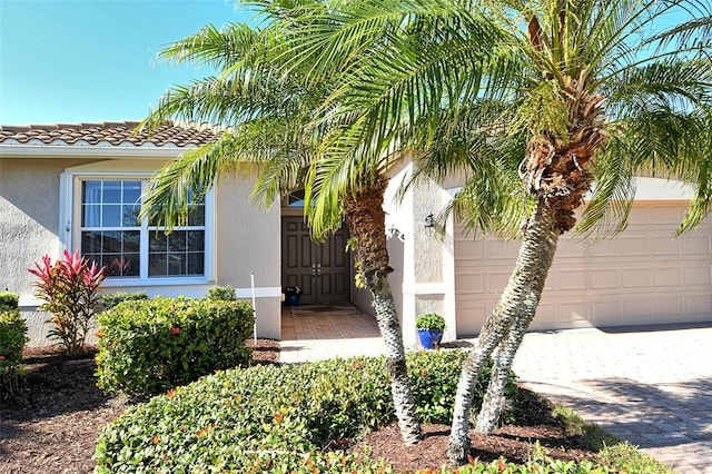 property entrance featuring a garage