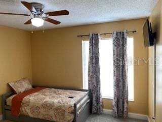 bedroom with carpet flooring and ceiling fan