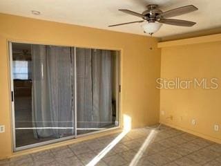 unfurnished room featuring ceiling fan