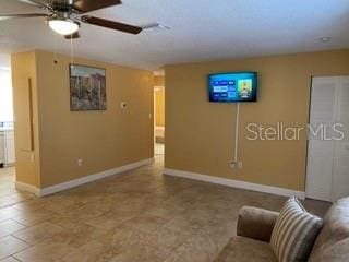 living room with ceiling fan