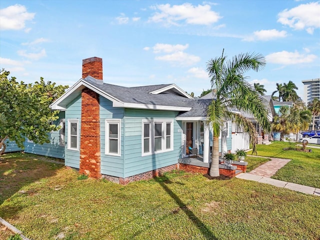 view of front of home with a front yard