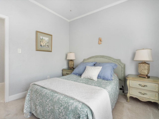 bedroom featuring ornamental molding and light carpet