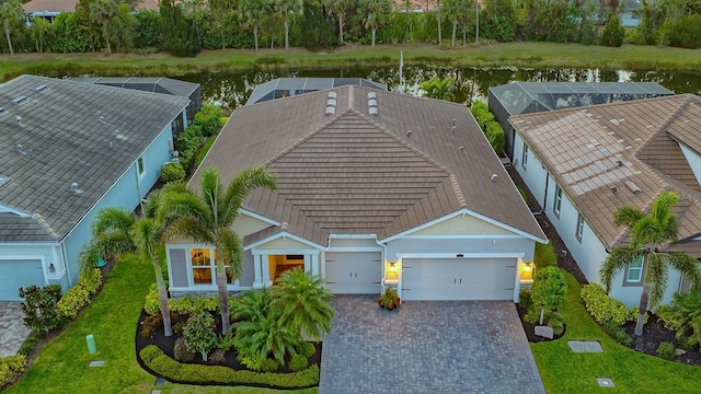 drone / aerial view featuring a water view