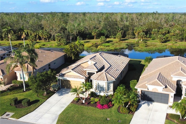 bird's eye view with a water view