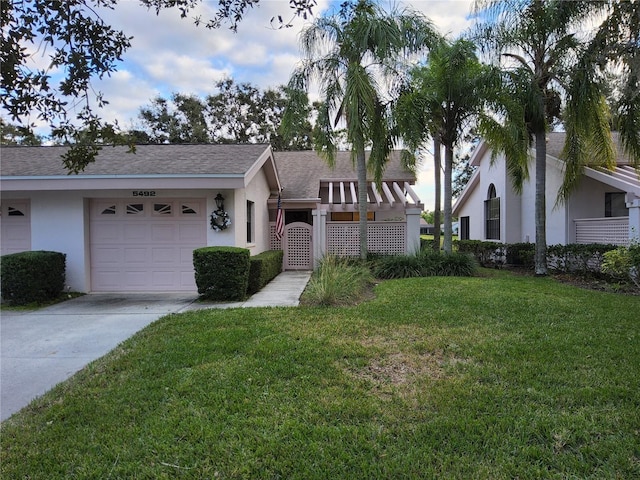 ranch-style house with a front lawn and a garage