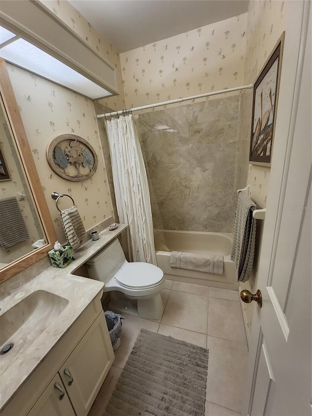 full bathroom with tile patterned flooring, vanity, toilet, and shower / bath combo with shower curtain