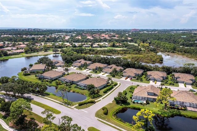 drone / aerial view with a water view