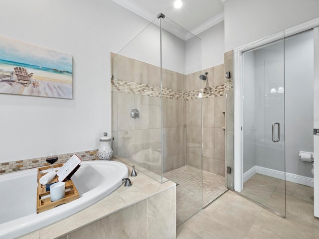 bathroom with separate shower and tub and ornamental molding