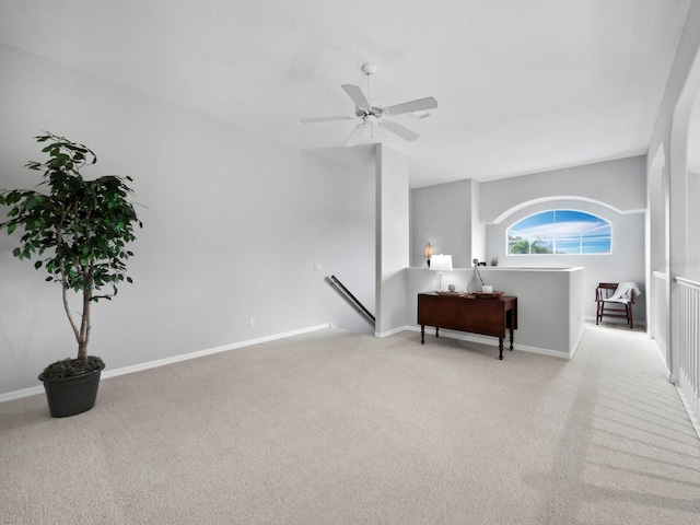 interior space featuring ceiling fan