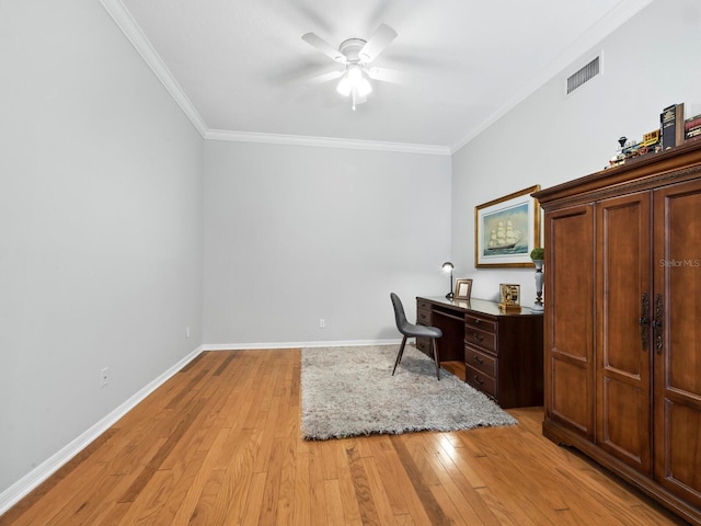 office area featuring ceiling fan, light hardwood / wood-style floors, and crown molding