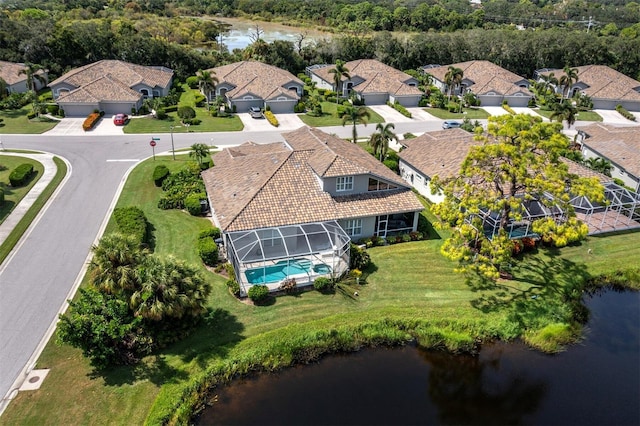 bird's eye view with a water view