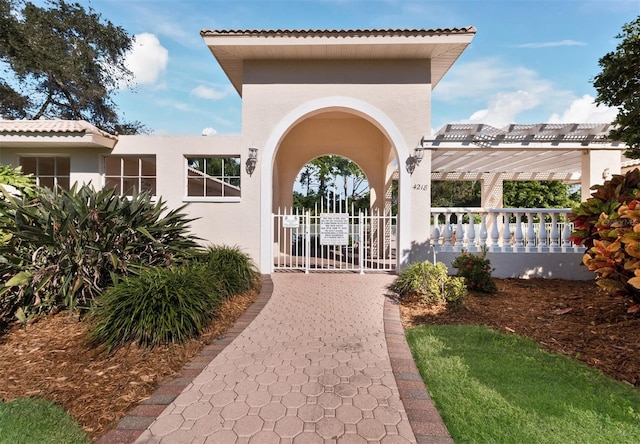 view of home's community with a pergola