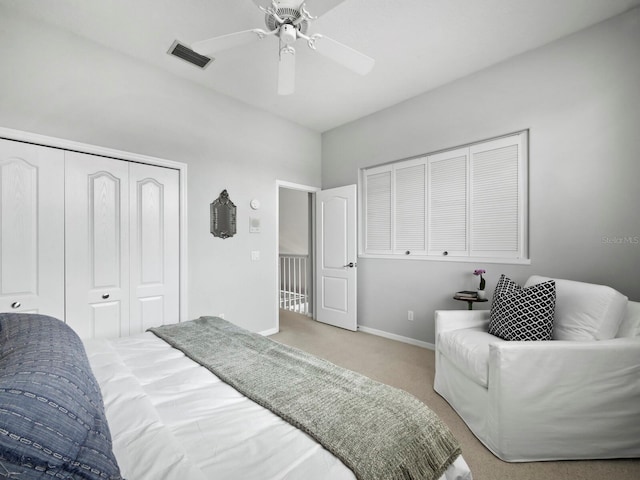 8737 Pebble Creek Ln, Sarasota, FL 34238 - bedroom featuring carpet floors, baseboards, a closet, and ceiling fan