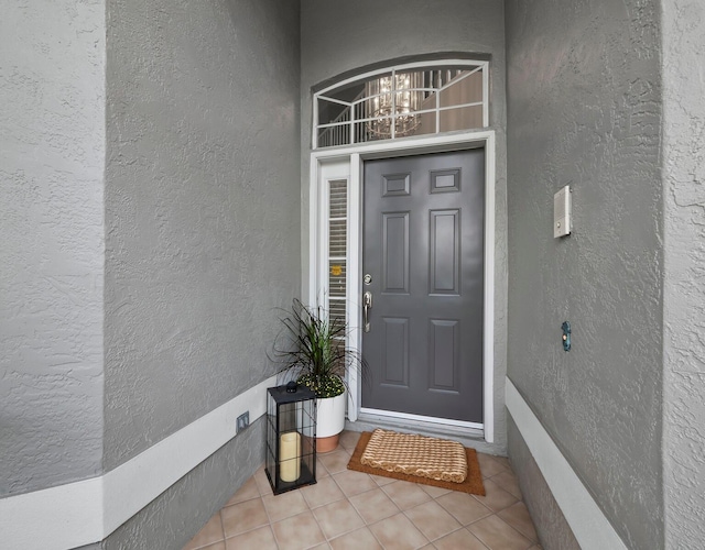8737 Pebble Creek Ln, Sarasota, FL 34238 - property entrance with stucco siding