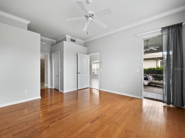 8737 Pebble Creek Ln, Sarasota, FL 34238 - empty room featuring ceiling fan, ornamental molding, baseboards, and wood finished floors