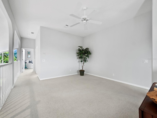 8737 Pebble Creek Ln, Sarasota, FL 34238 - spare room with ceiling fan, baseboards, and light colored carpet