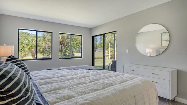 bedroom with hardwood / wood-style flooring