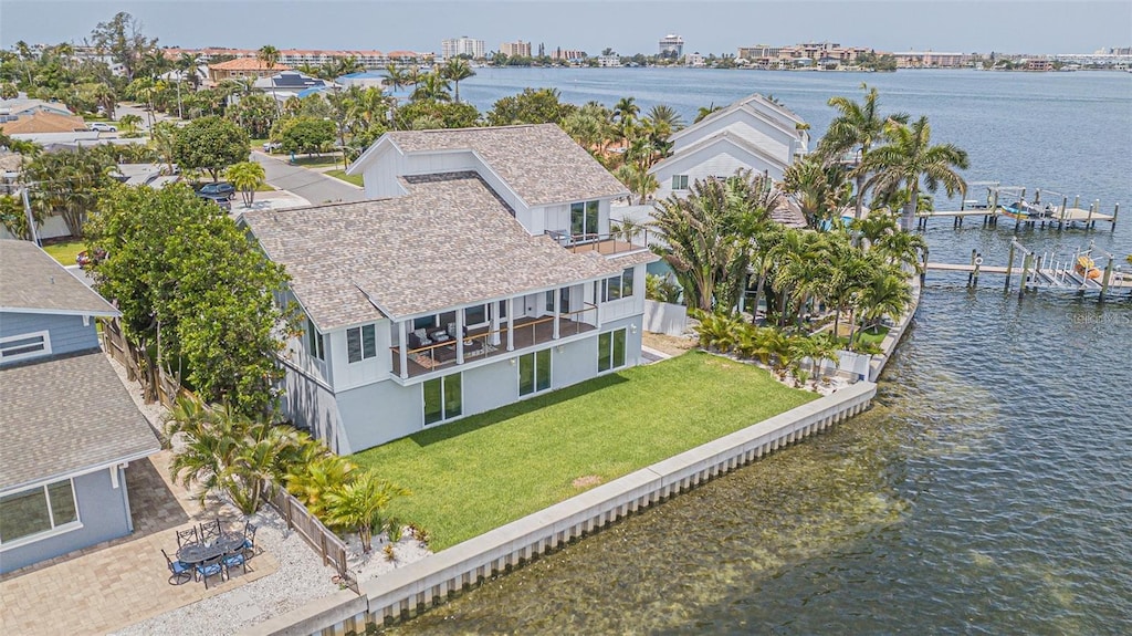 drone / aerial view with a water view