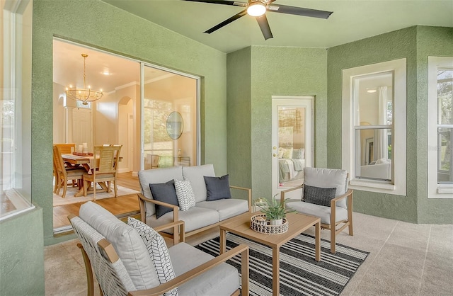 view of patio with ceiling fan and an outdoor hangout area