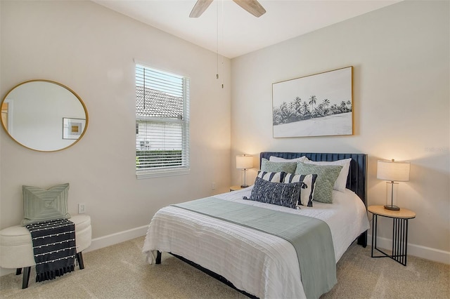 bedroom featuring ceiling fan and light colored carpet