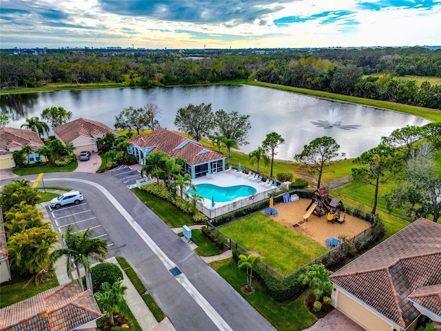 drone / aerial view with a water view