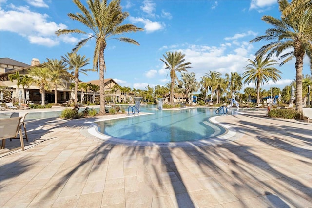 view of pool featuring a patio area