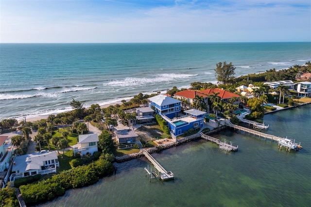 drone / aerial view featuring a water view