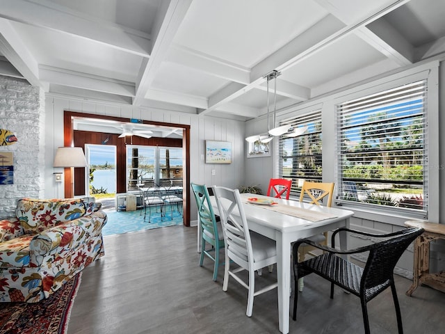 dining area with beamed ceiling, hardwood / wood-style flooring, ceiling fan, and coffered ceiling