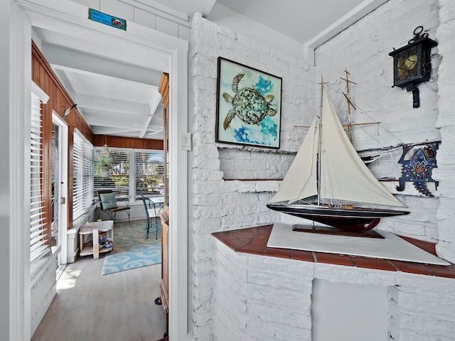 room details with hardwood / wood-style floors and beam ceiling