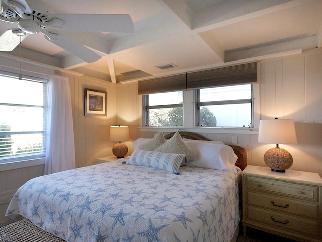 bedroom with beamed ceiling, ceiling fan, and coffered ceiling