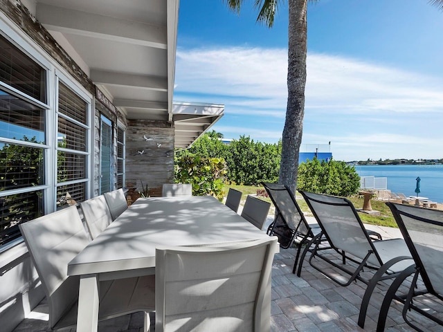 view of patio / terrace with a water view