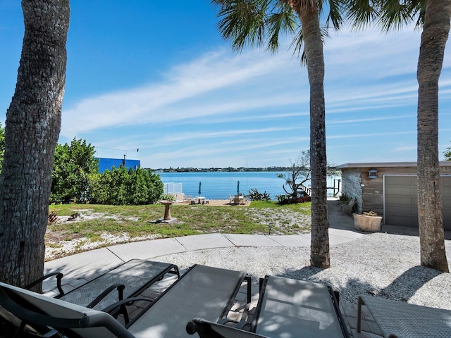 view of patio / terrace with a water view