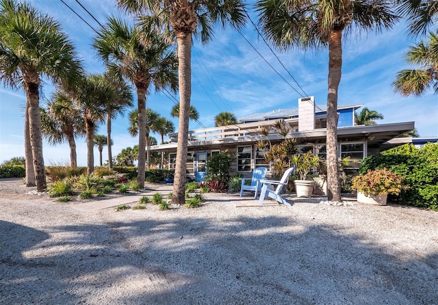 1620 Casey Key Rd, Nokomis, FL 34275 - view of front of property with a chimney