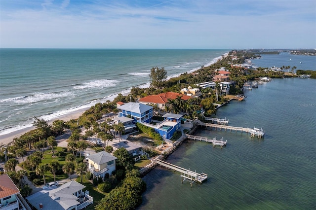 bird's eye view with a view of the beach and a water view