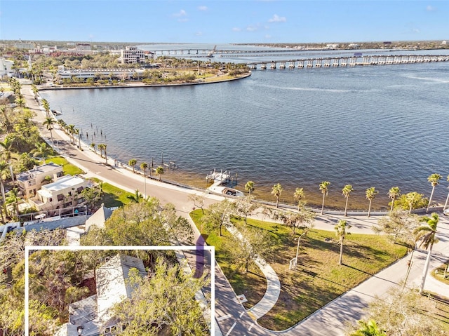 bird's eye view with a water view