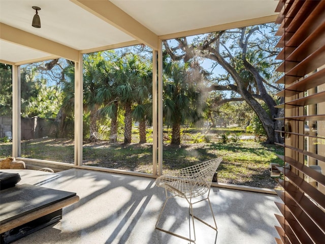 unfurnished sunroom with a wealth of natural light