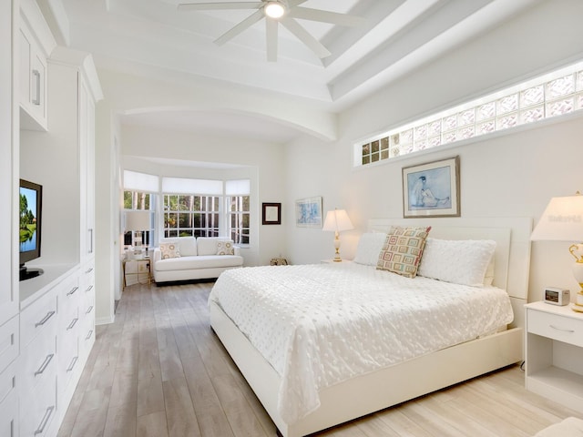 bedroom with light wood-type flooring and ceiling fan