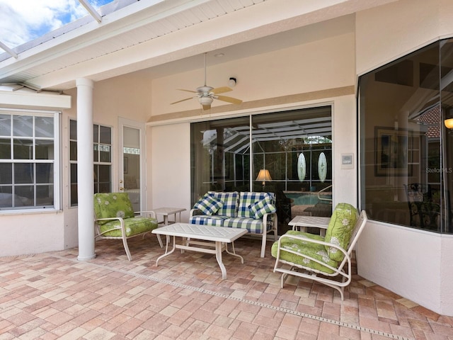 view of patio featuring ceiling fan