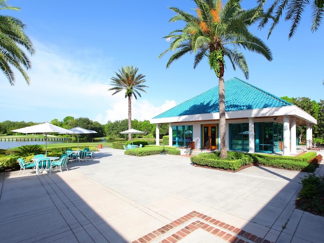 view of property's community featuring a patio