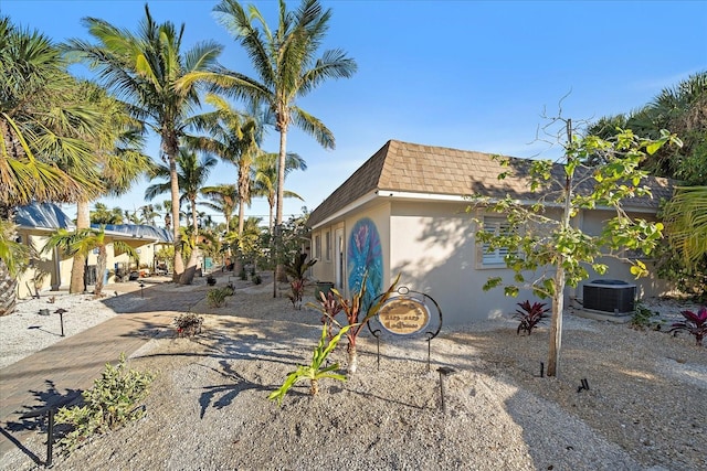 view of home's exterior with central air condition unit