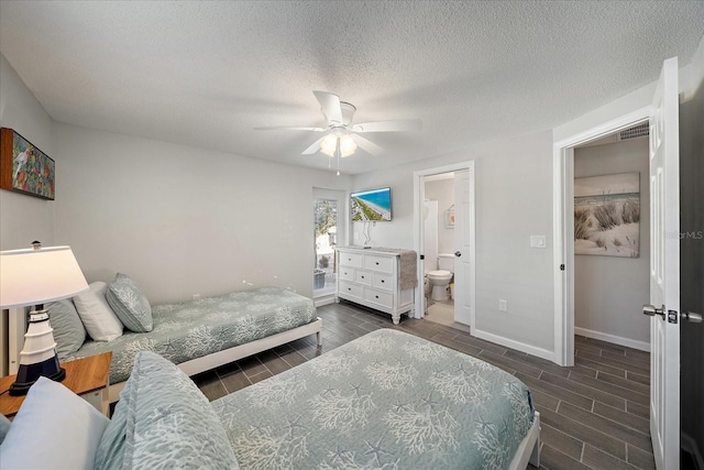 1123 Crescent St Unit 1123/1125, Sarasota, FL 34242 - bedroom with wood finish floors, baseboards, a ceiling fan, ensuite bath, and a textured ceiling