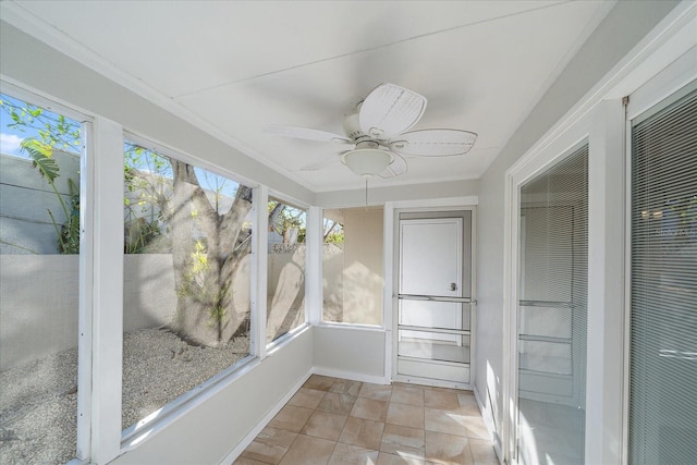 1123 Crescent St Unit 1123/1125, Sarasota, FL 34242 - unfurnished sunroom with a ceiling fan and a heating unit