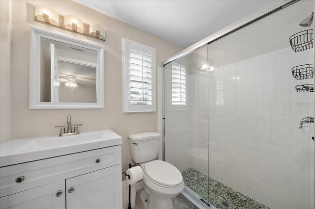 1123 Crescent St Unit 1123/1125, Sarasota, FL 34242 - full bath with a stall shower, vanity, and toilet