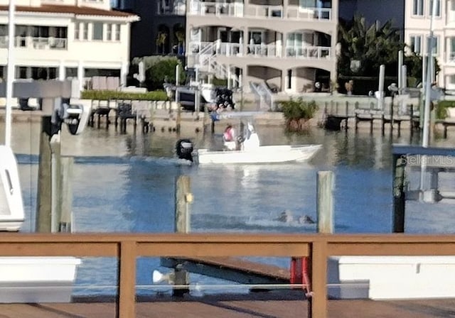 dock area with a water view