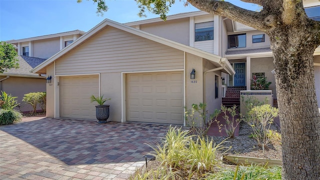 front of property with a garage